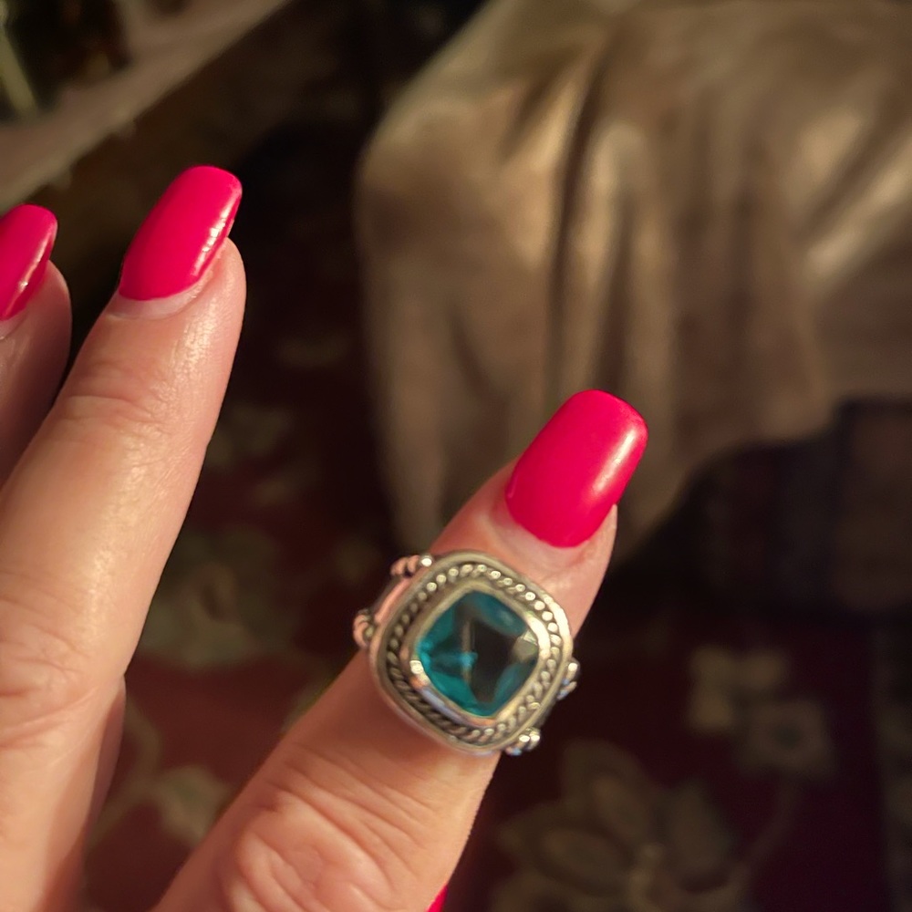 This is a Sterling Silver Emerald Ring. 925